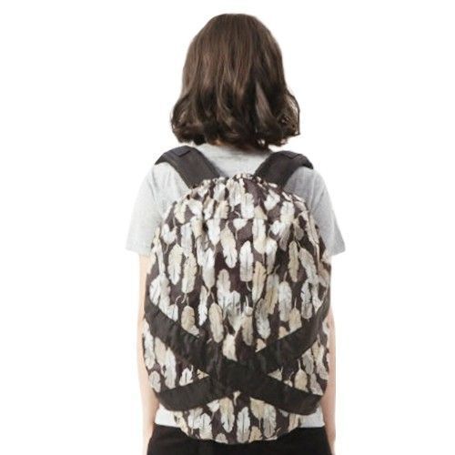 日本 KiU：2WAY 後背包雨衣